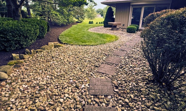Stone mulch and stepping stone garden path