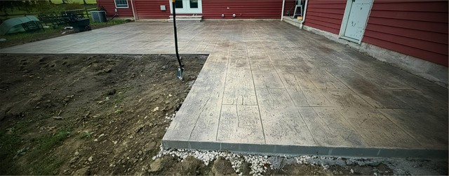 Wide barn wood effect patio at red house