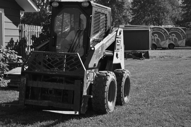 Wide slab lift with tracked loader and lawn