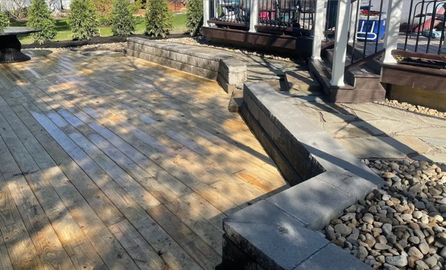 Wood look stamped patio and masonry edge