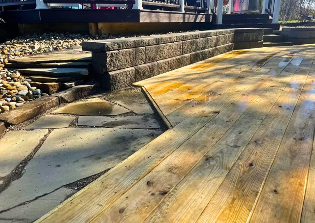 Stamped patio with block retaining edge