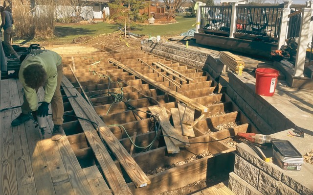 Crew rebuilding deck structure