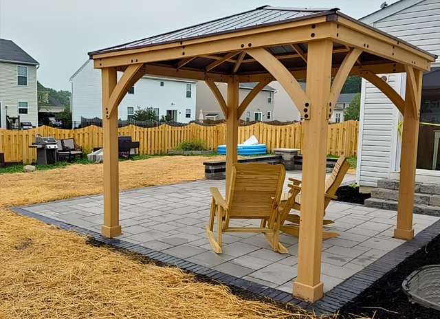 Timber pavilion over small paver pad