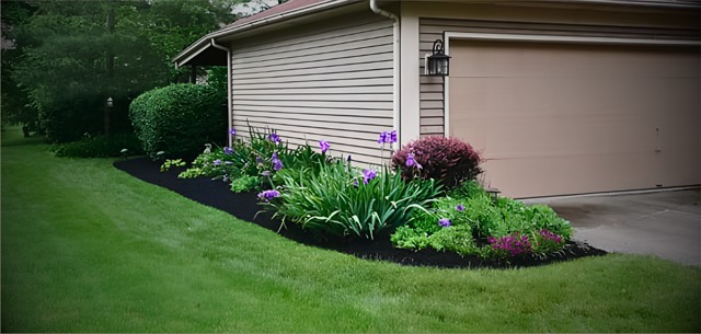 Garage planting beds and lawn