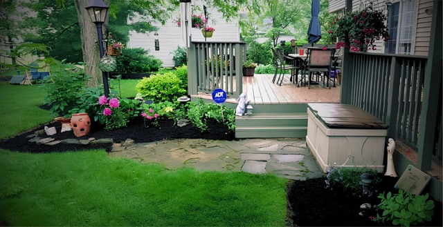Deckside garden and fresh mulch