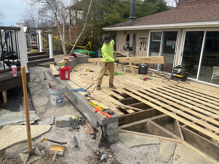 new-patio-retaining-wall-with-cap-and-deck-also-landscaping-and-hardscapeing-combo-gutter-repair-1
